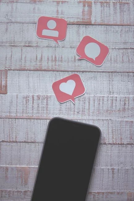 Close-up of a notebook page with Social Media Marketing handwritten on it.